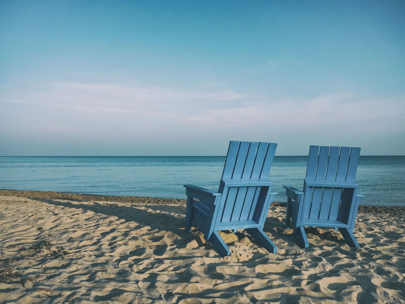 Two chairs by the beach, a sign of retirement lifestyle