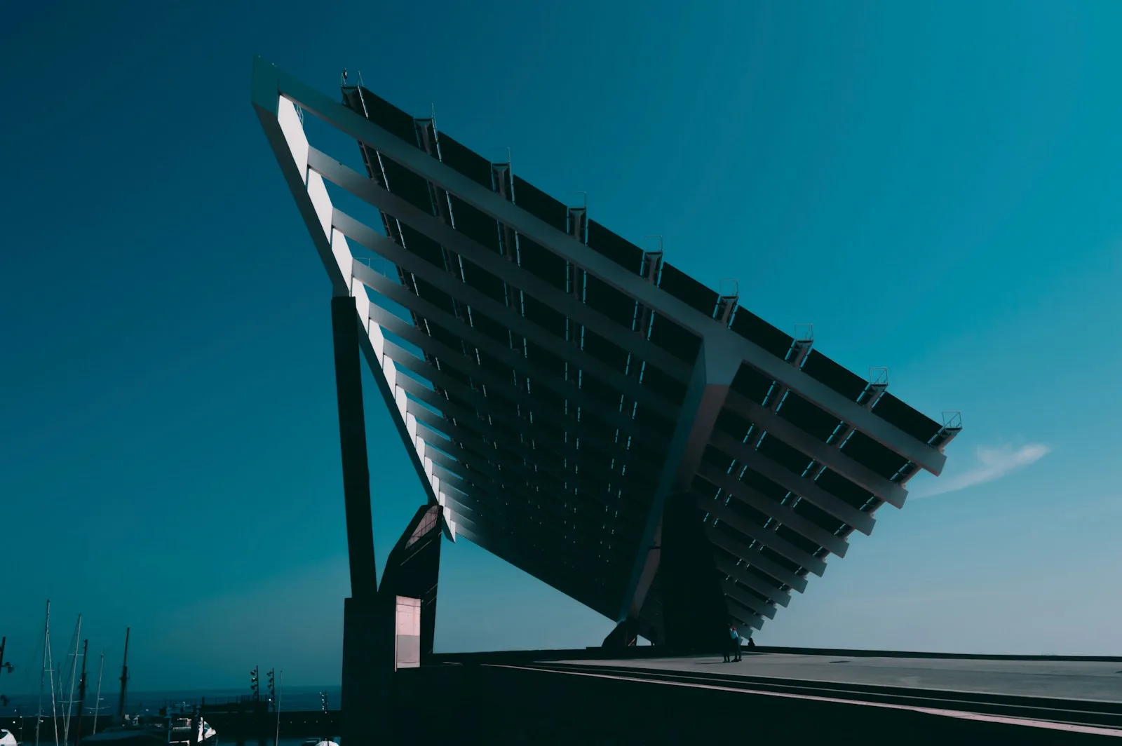 Photos of solar panels installed on top of a building, which is an eco-friendly option and also cheaper