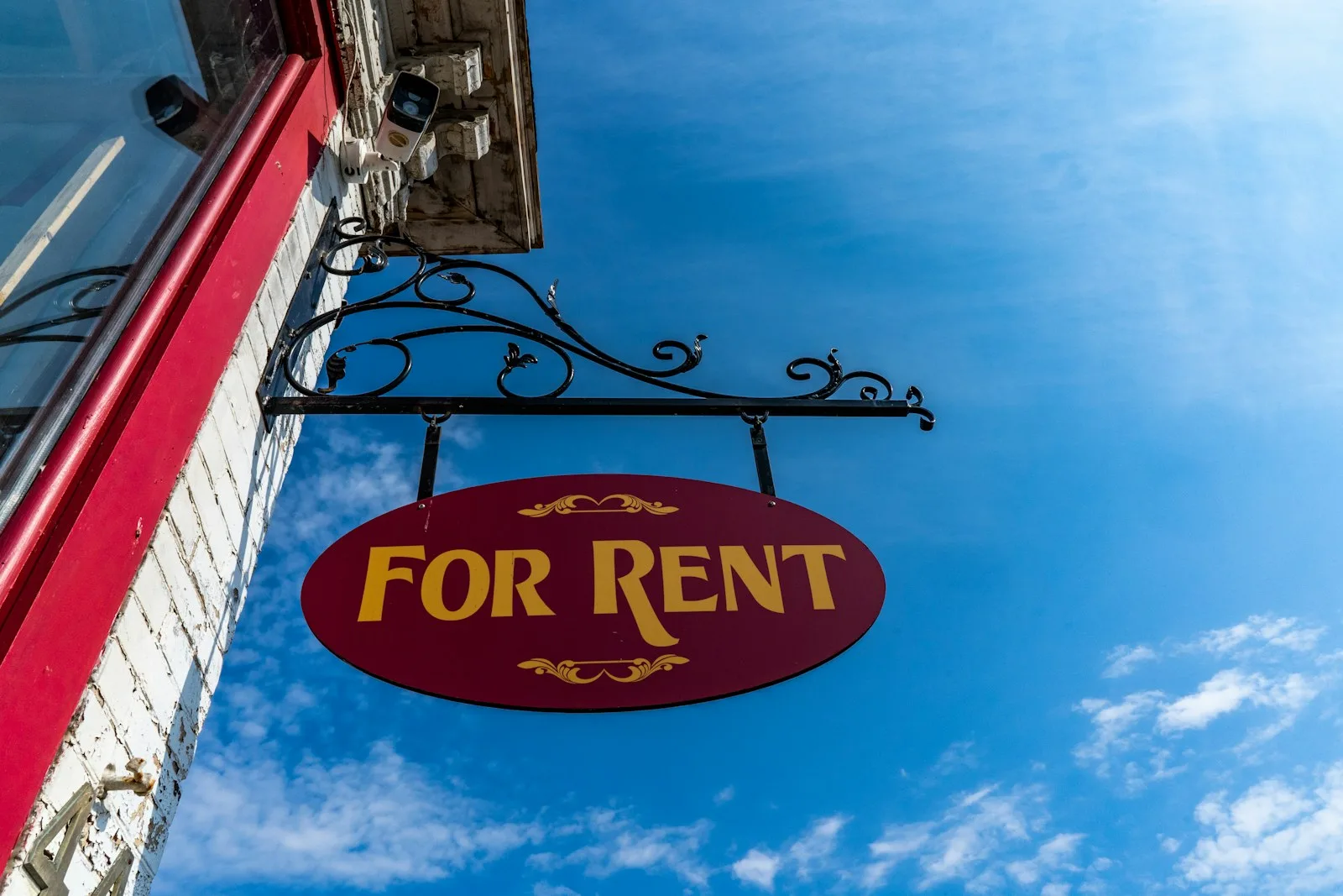 A sign showing “For Rent”