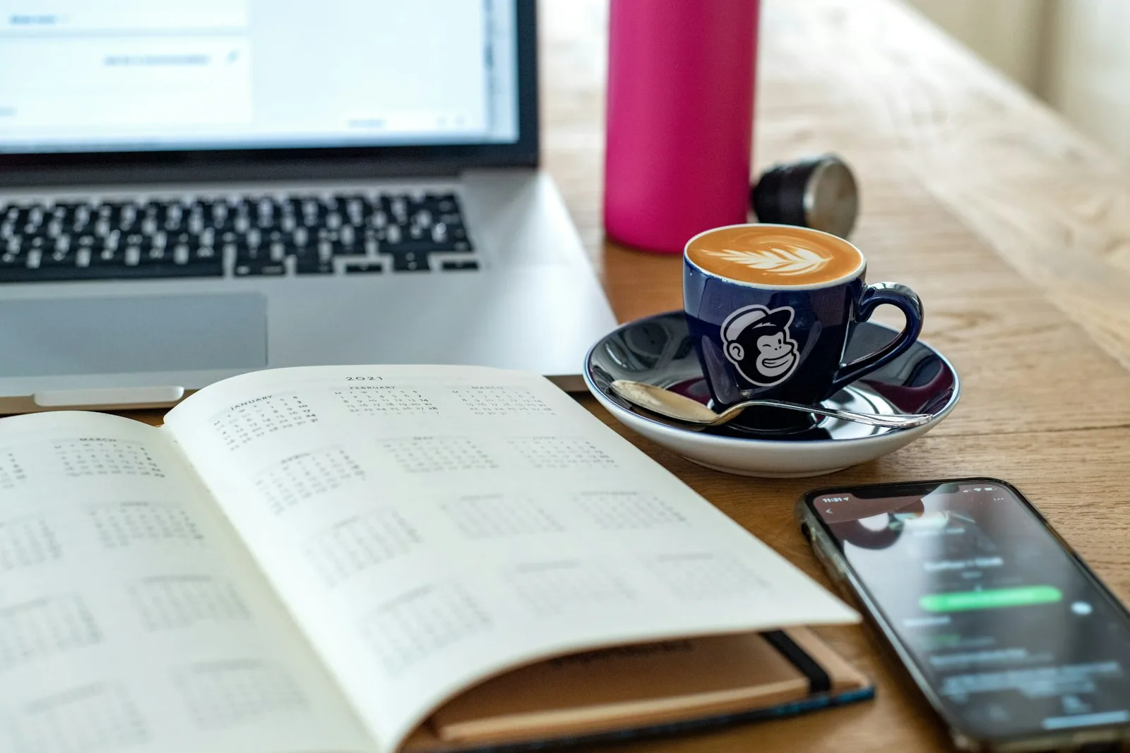 A person setting finance goals over a cup of coffee for the entire year