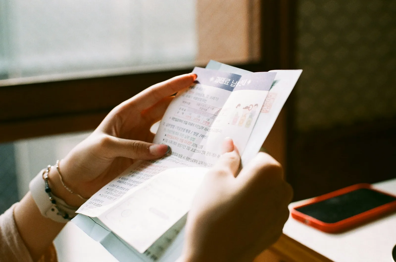 Photo of a person reviewing their medical bill carefully
