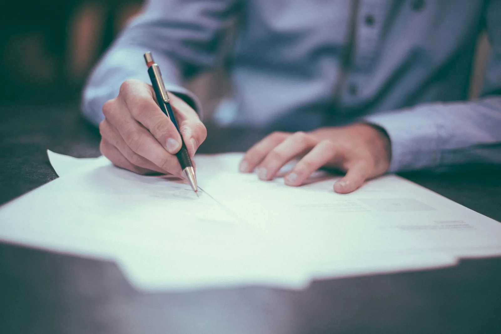 A person signing documents for claim settlement of his insurance