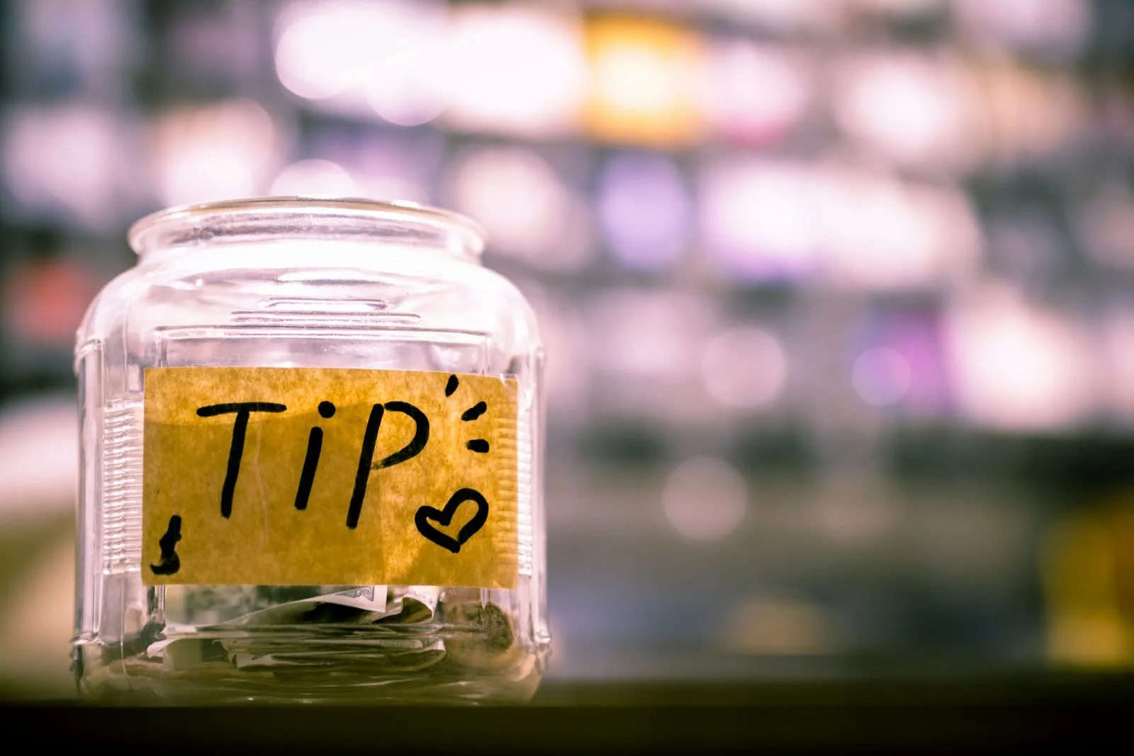 Photo of the a jar half filled with Tips