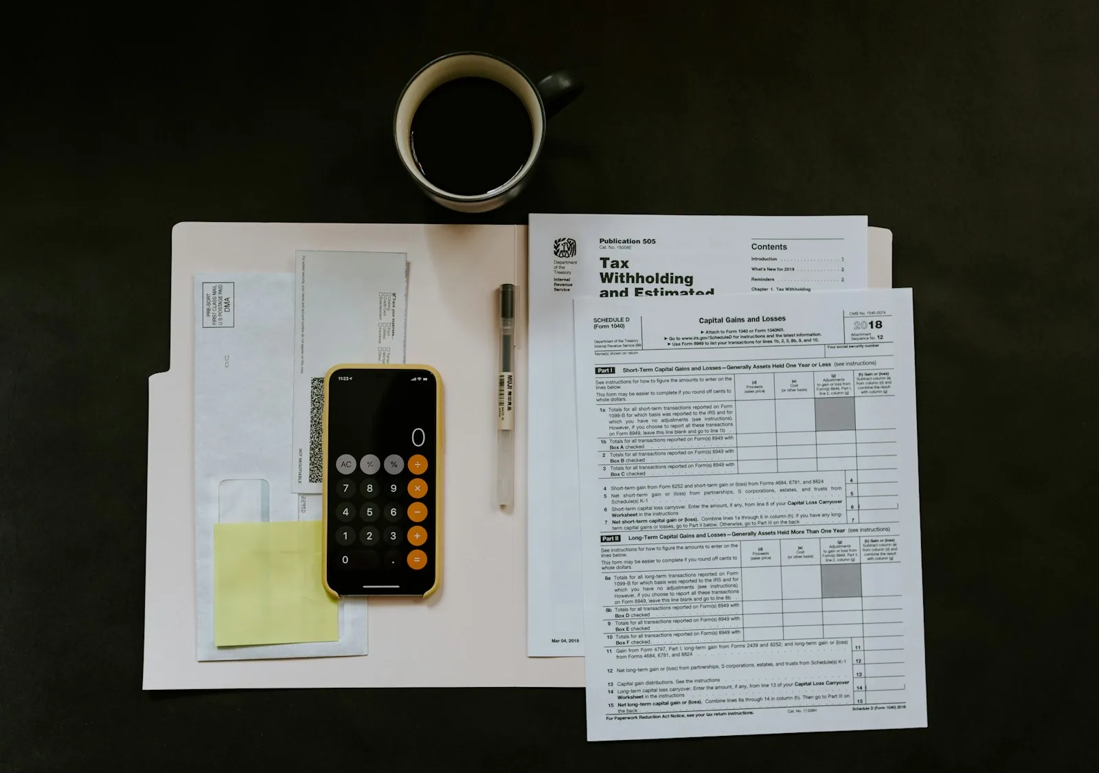 Image of paper and calculator for calculating tax