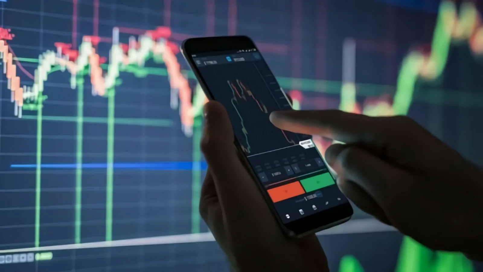 A person investing in the stock market through an investment application