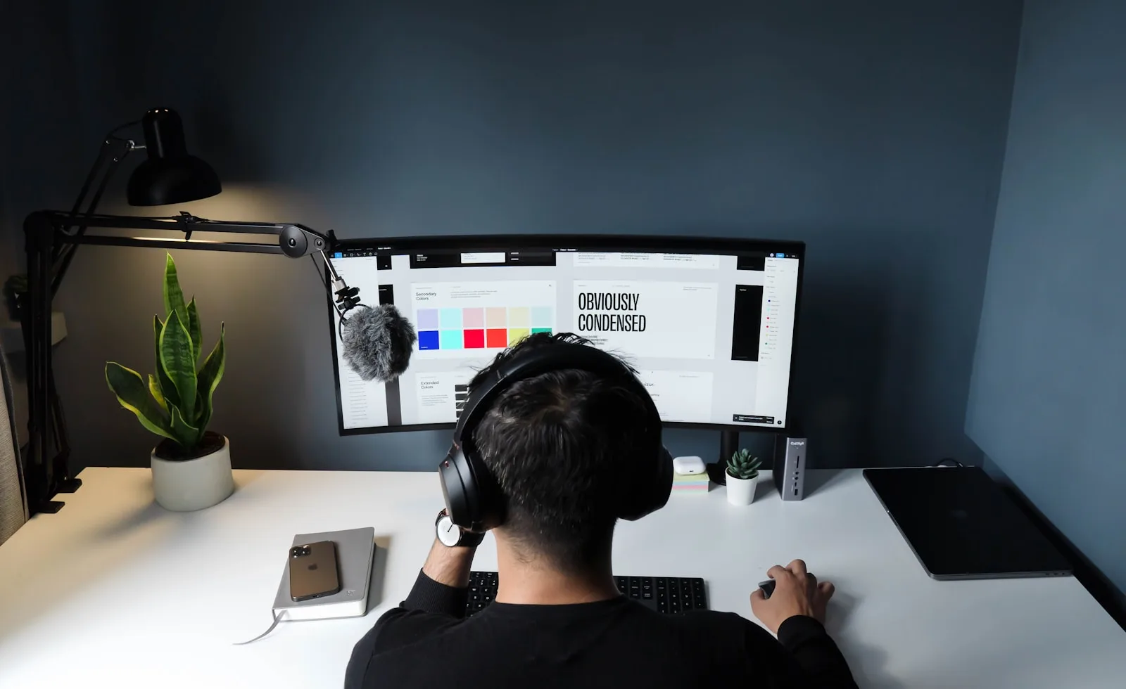 A young gentleman building up his freelancing resume and portfolio to get more clients