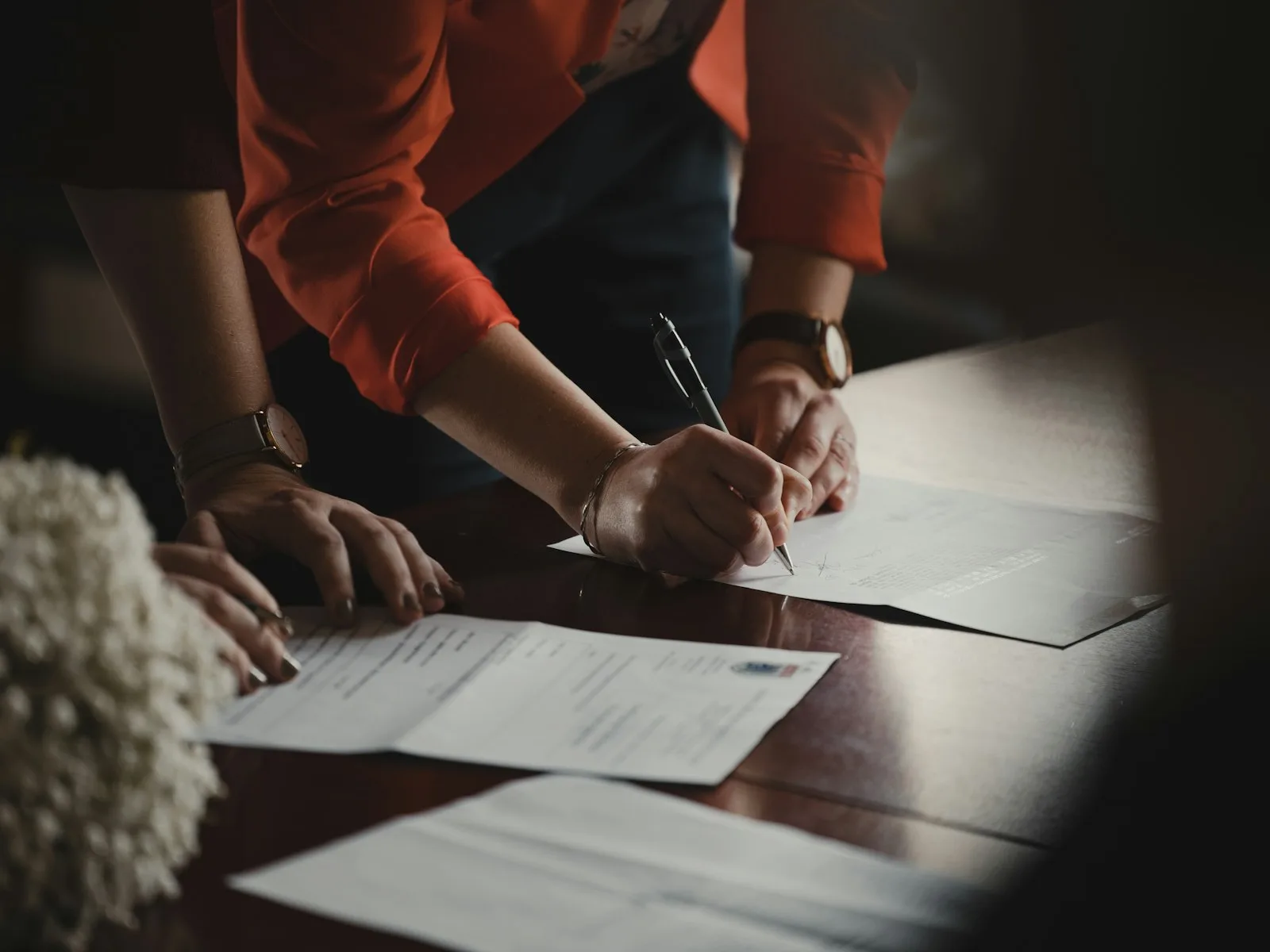 A person working with a financial advisor, discussing debt consolidation options.